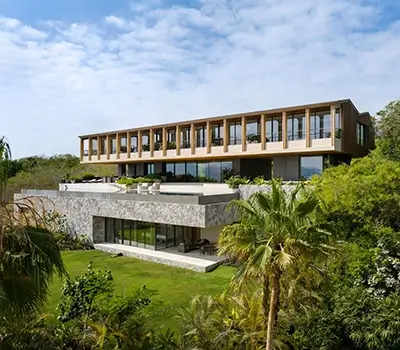 Two-story house with a balcony and a pool