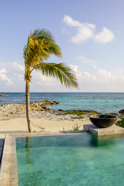 Infinity pool overlooking the ocean in Riviera Maya