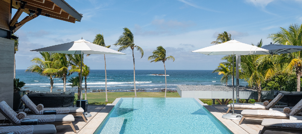 Casa Vaivén in Punta Mita showing the organic architecture and infinity pool overlooking the Pacific Ocean
