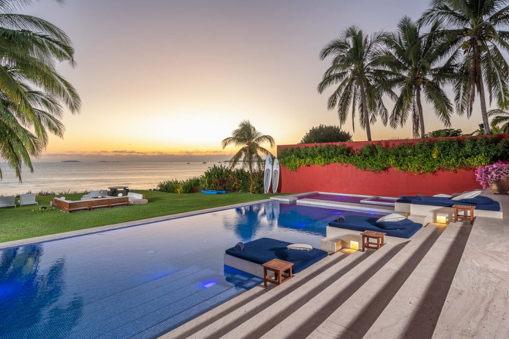 Minimalist beach house Villa Pacifica in Punta Mita highlighting direct private access to the sand and ocean.