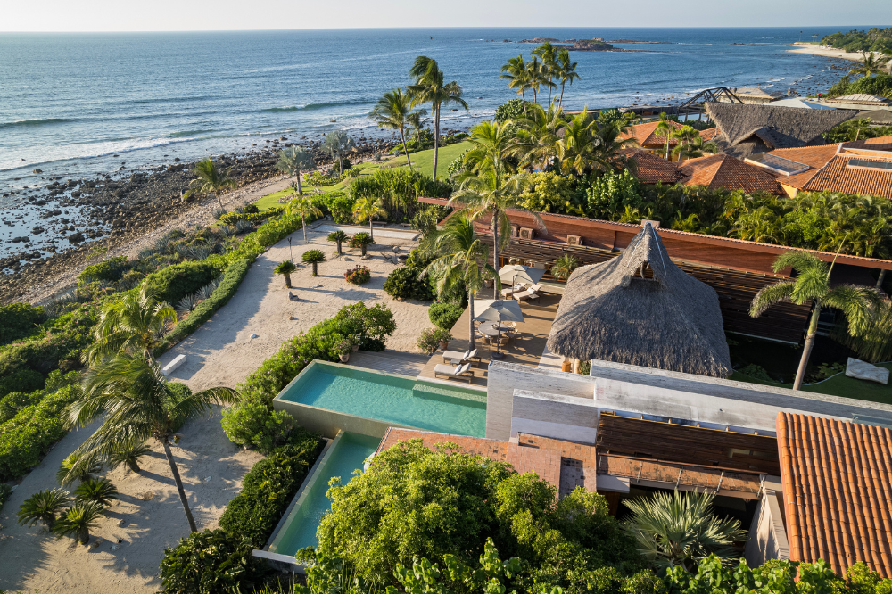 Oceanfront estate Villa Samba in the La Punta area of Punta Mita with unique architecture and views of the local surf break.